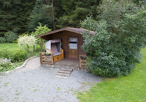 Blockhütte mit Grill